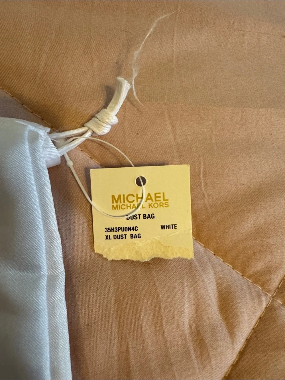 Michael Kors light cream